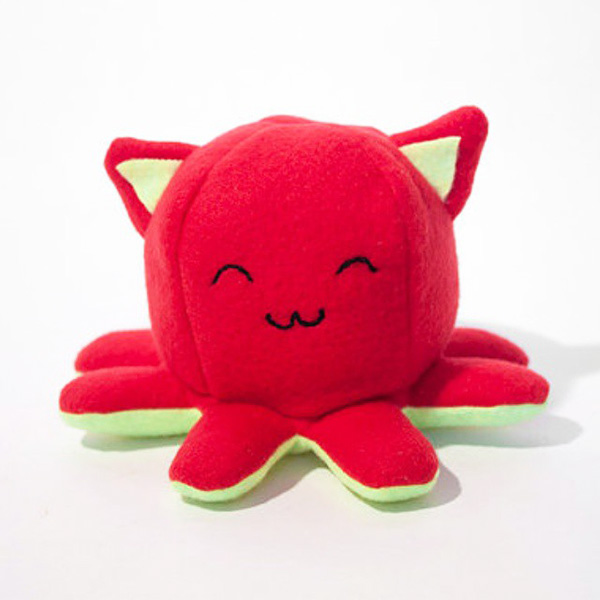 The first successful Taneko the Octo-puss plush toy was red and light green