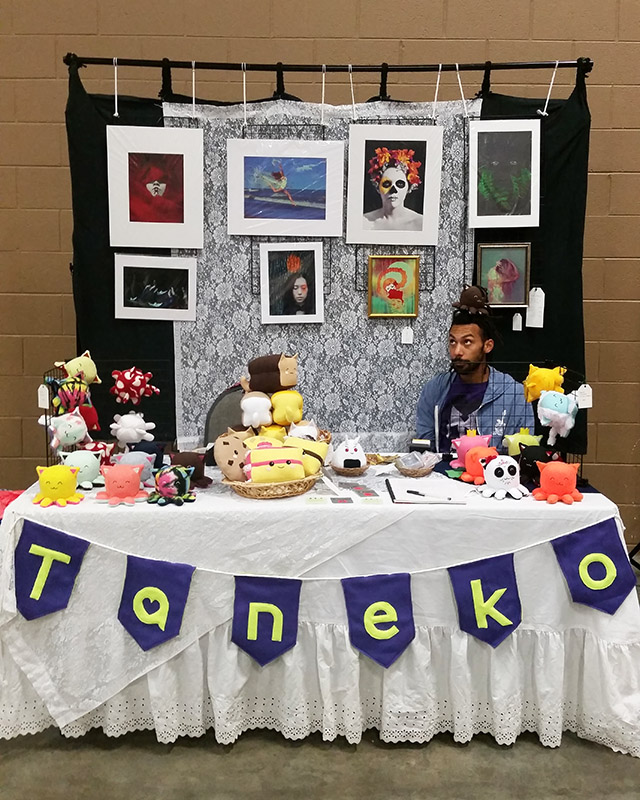 Taneko Says Hello table booth display at Oddmall