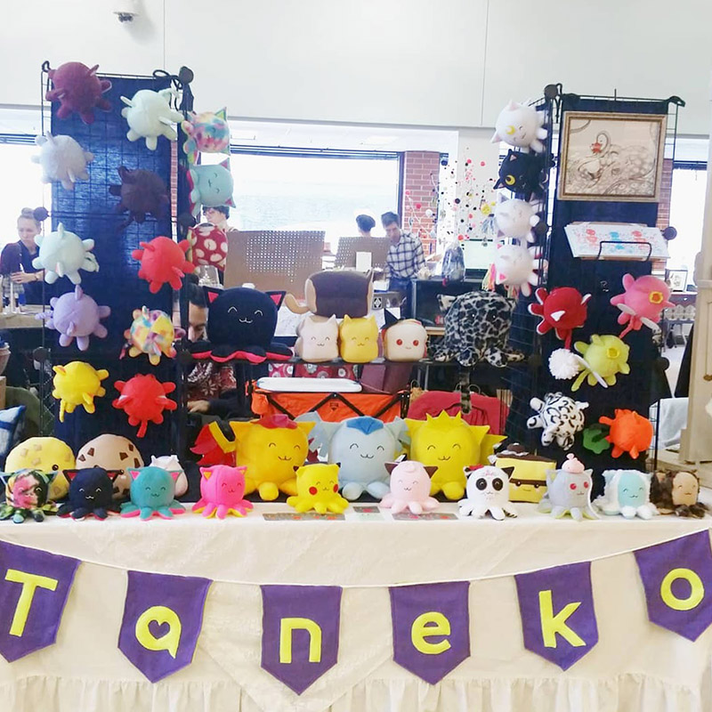 Taneko Says Hello table booth display at Tiny Expo