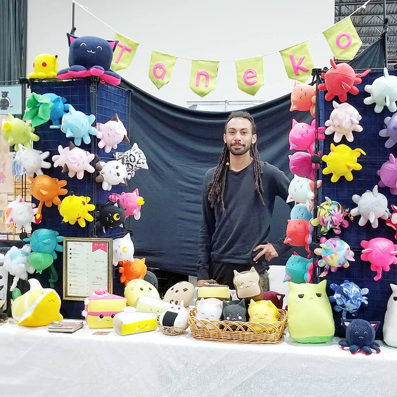 Taneko Says Hello table booth display at Motor City Comic Con