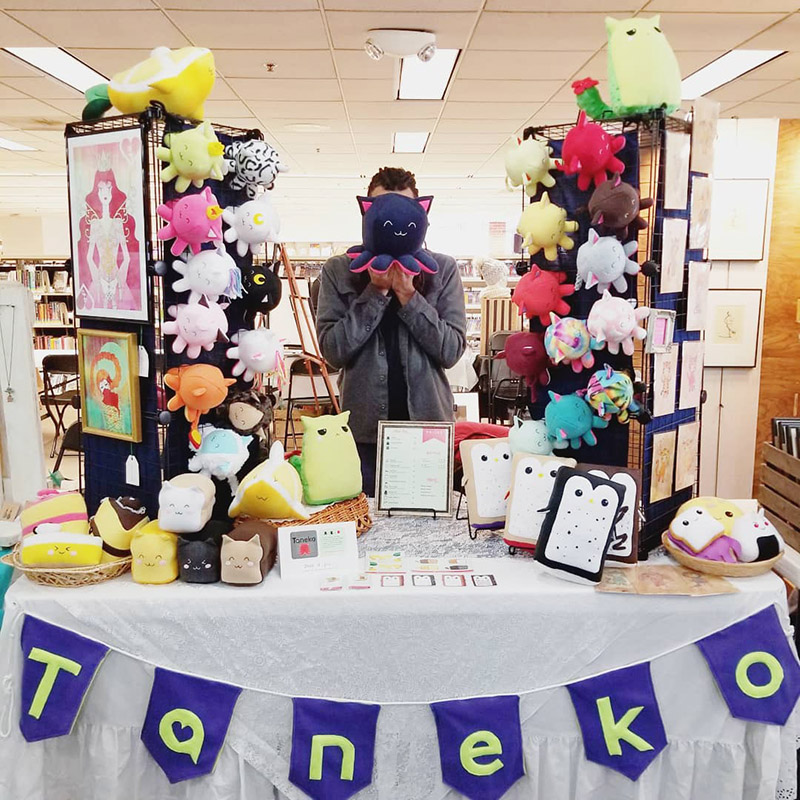 Taneko Says Hello table booth display at Tiny Expo