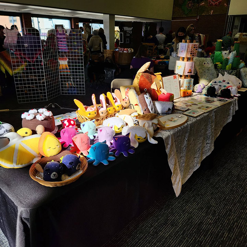 Taneko Says Hello table booth display at Ann Arbor Fiber Arts Expo