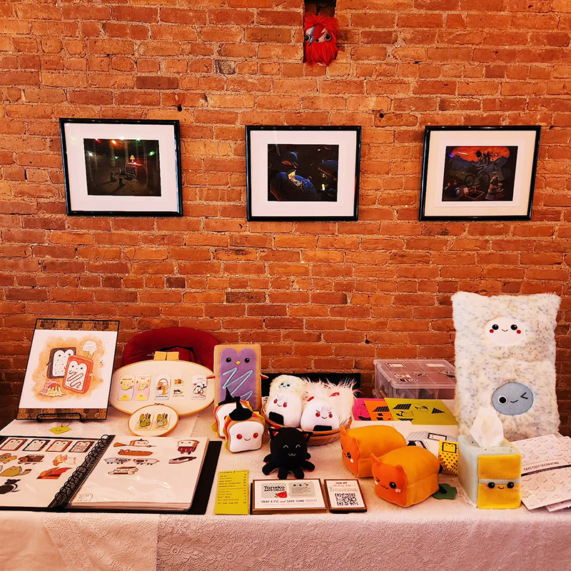 Taneko Says Hello table booth display at Ziggy's Holiday Market