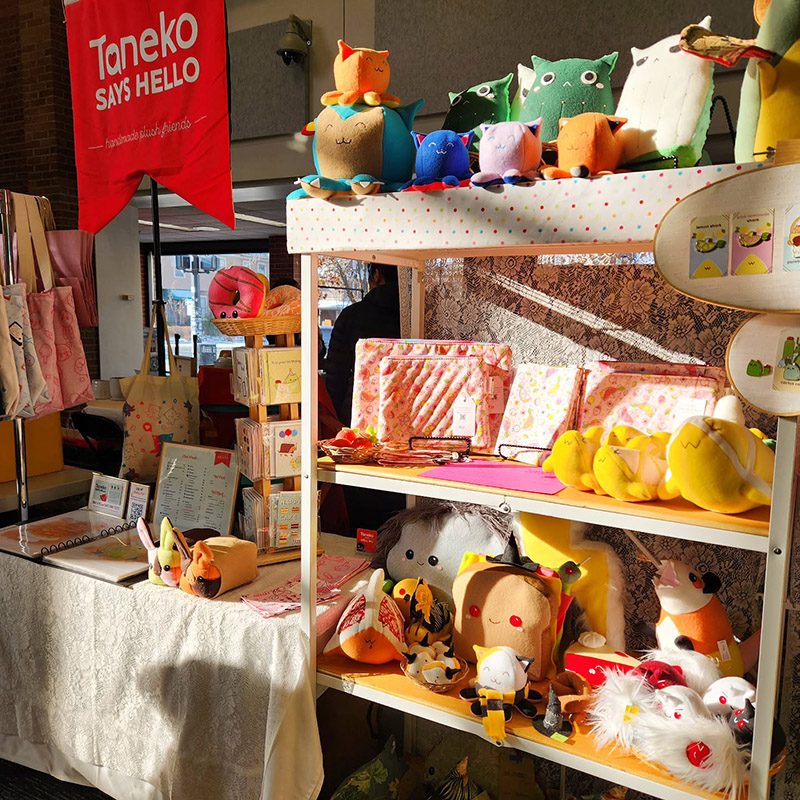 Taneko Says Hello table booth display at Tiny Expo