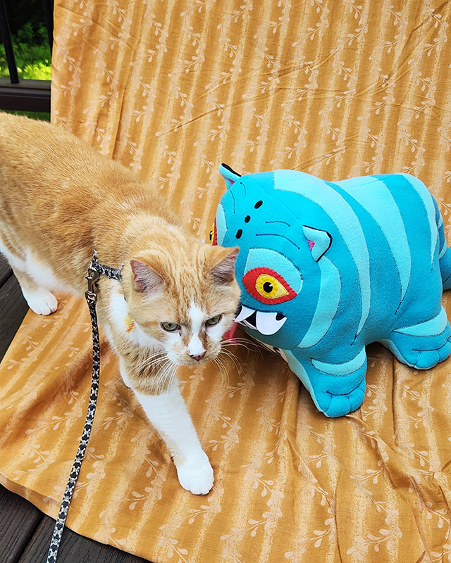 Derpy Tiger from KPop Demon Hunters with orange and white cat
