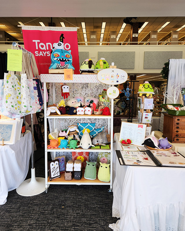 Taneko Says Hello table booth display at Tiny Expo